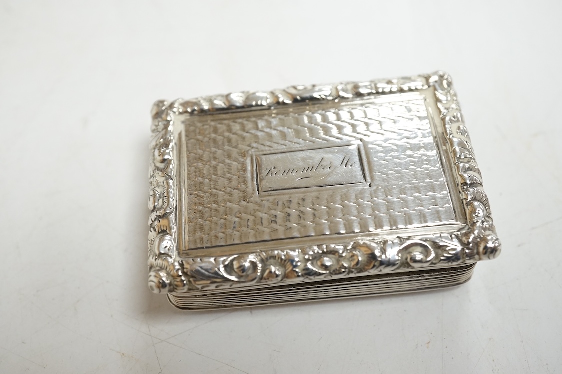 A William IV engine turned silver rectangular vinaigrette, by William Simpson, Birmingham, 1830, the central cartouche engraved 'Remember Me', 42mm (grille detached).
